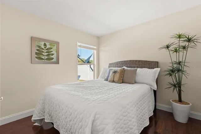 a bedroom with a bed and a closet