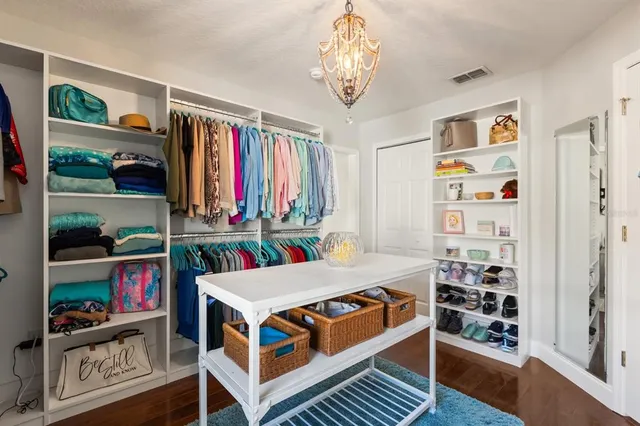 a room with furniture and a book shelf