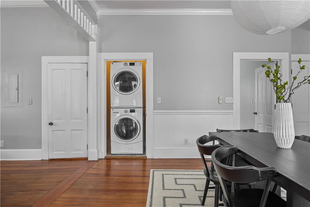 2891 Macaw Street Northwest Atlanta, GA 30318 - Photo 14 of 26 a view of a dining room with furniture and wooden floor
