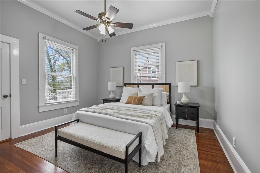 2891 Macaw Street Northwest Atlanta, GA 30318 - Photo 20 of 26 a bedroom with a bed and a window