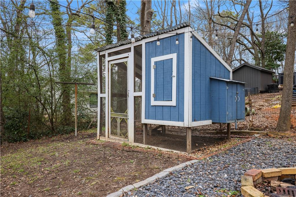 2891 Macaw Street Northwest Atlanta, GA 30318 - Photo 25 of 26 a backyard of a house