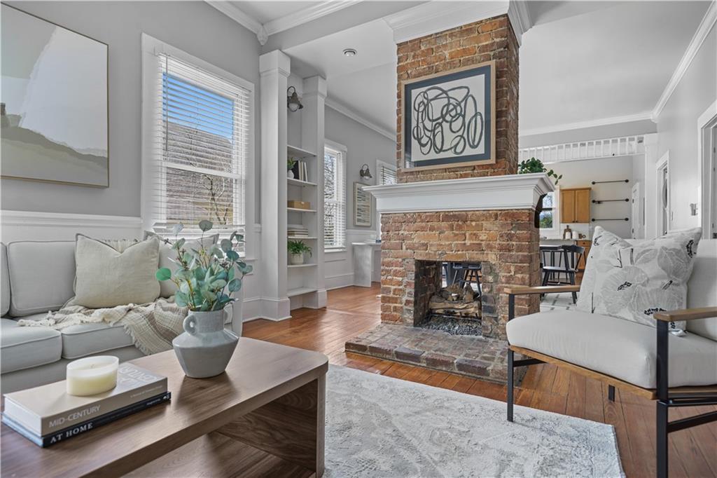 2891 Macaw Street Northwest Atlanta, GA 30318 - Photo 5 of 26 a living room with furniture and a fireplace
