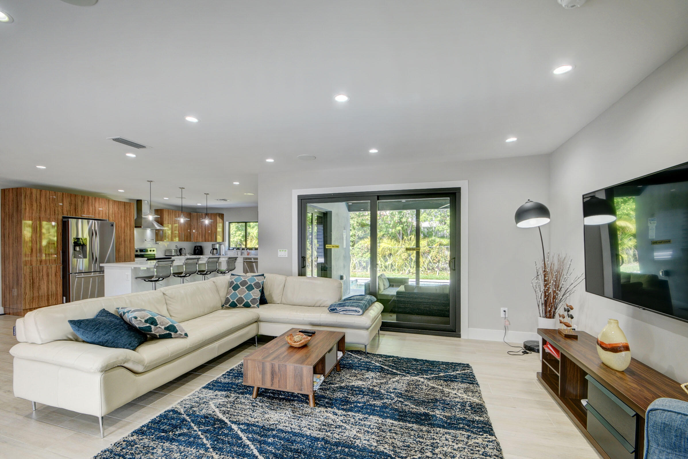 1230 Gulfstream Way Singer Island, FL 33404 - Photo 7 of 40 LIVING ROOM & KITCHEN