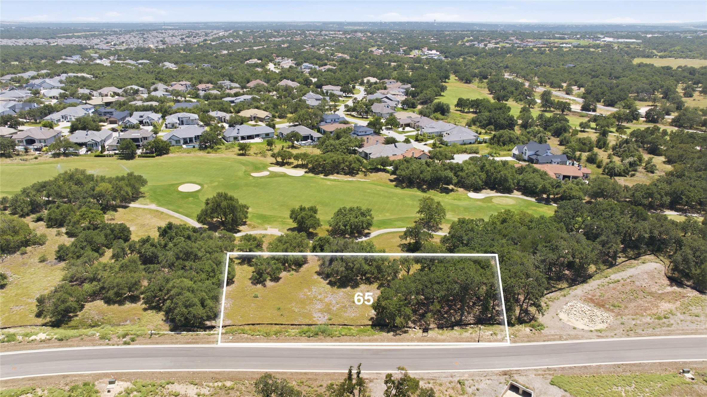 413 Lightning Rnch Road Georgetown, TX 78628 - Photo 3 of 8 A spacious lot, bordered by a golf course and a residential community, offers a prime building site.