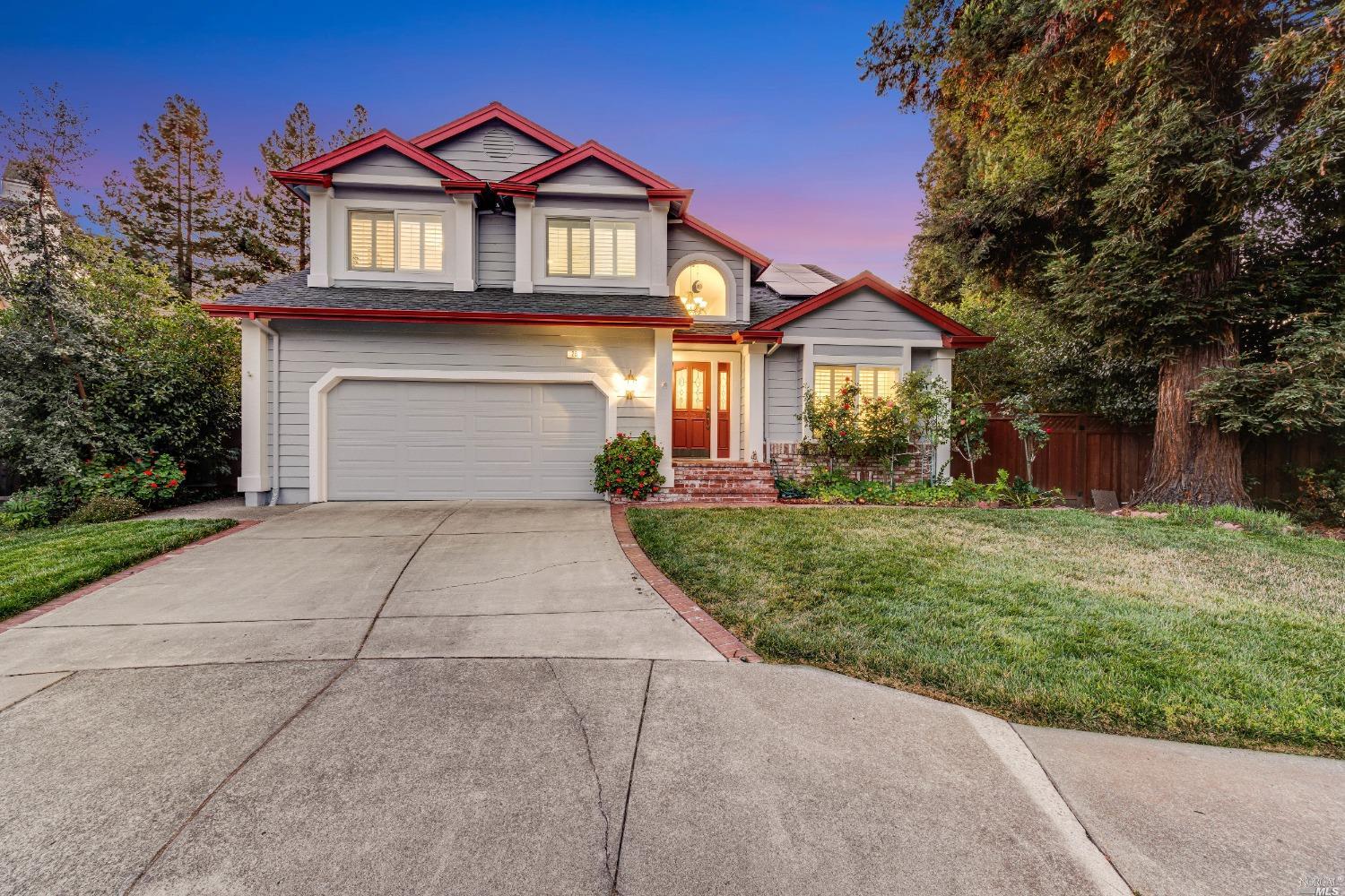 28 Hop Ranch Court Santa Rosa, CA 95403 - Photo 1 of 1 a front view of a house with a yard and garage