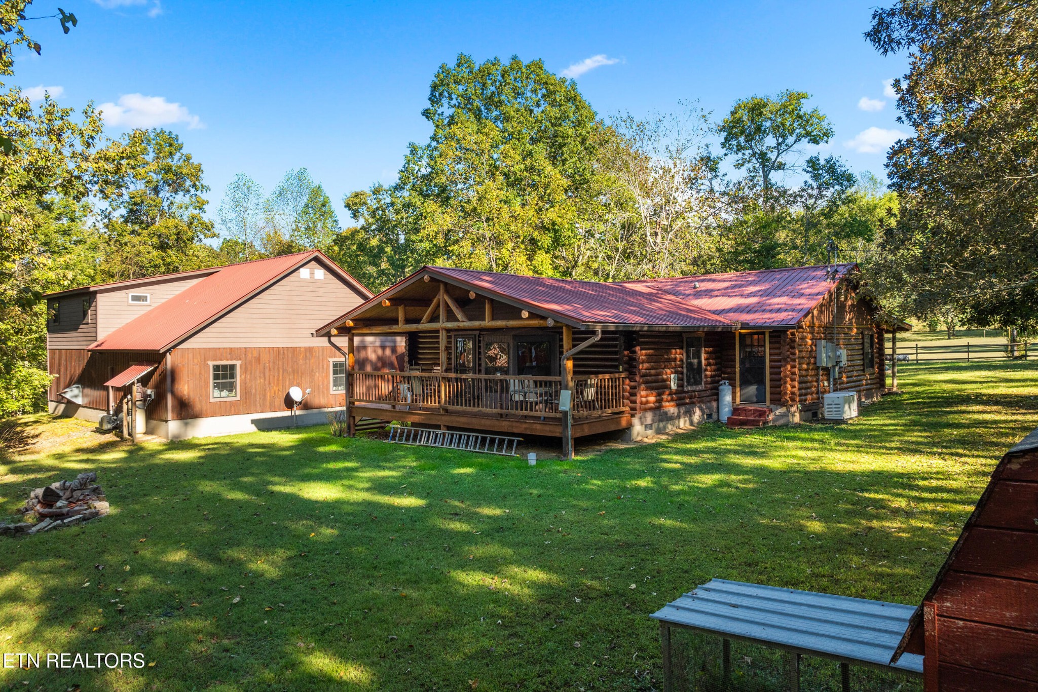 228 Pattie Gap Road Philadelphia, TN 37846 - Photo 28 of 57 a view of a house with a yard porch and sitting area