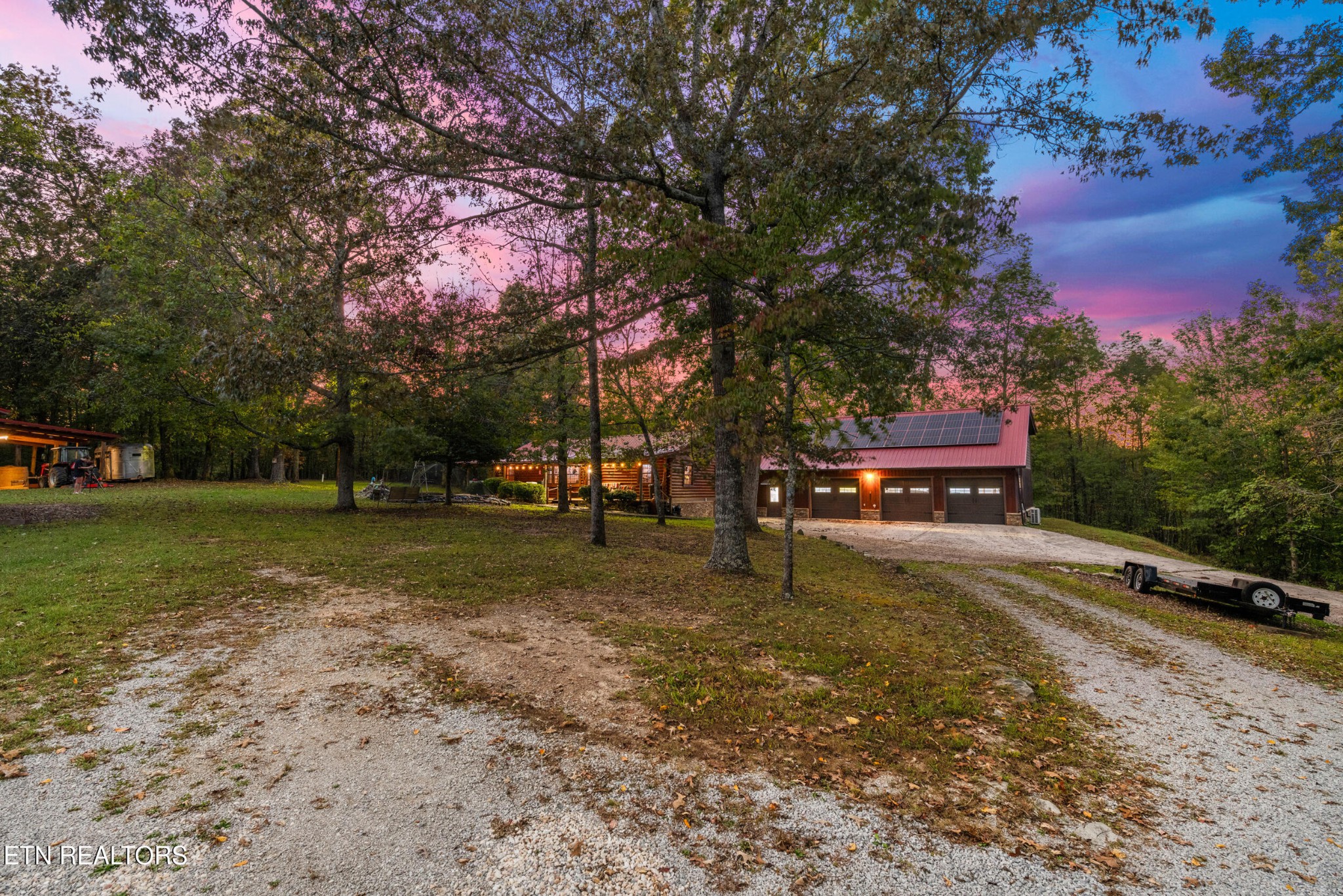 228 Pattie Gap Road Philadelphia, TN 37846 - Photo 33 of 57 a view of a tree in front of a house with a big yard