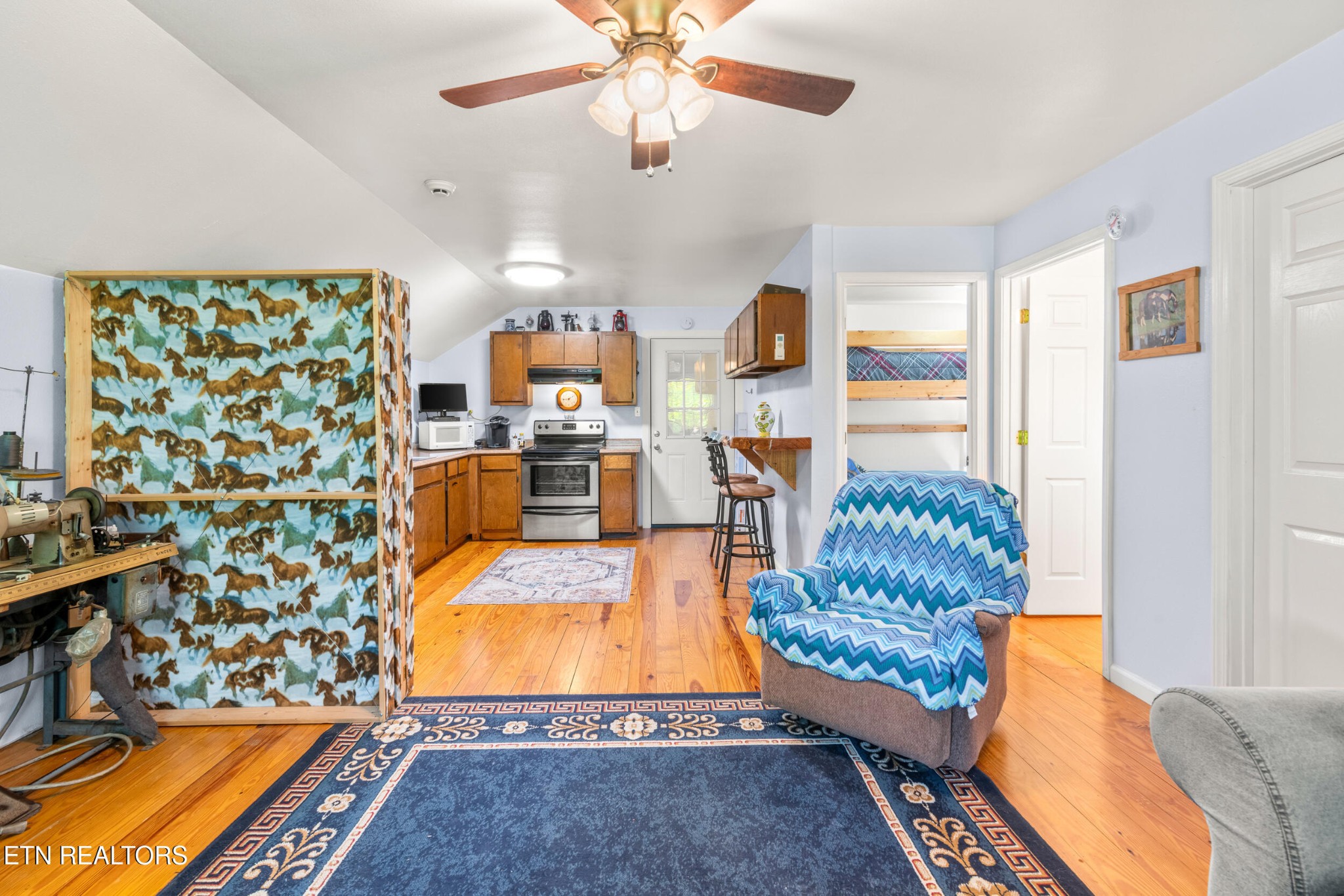 228 Pattie Gap Road Philadelphia, TN 37846 - Photo 38 of 57 a living room with furniture and a rug