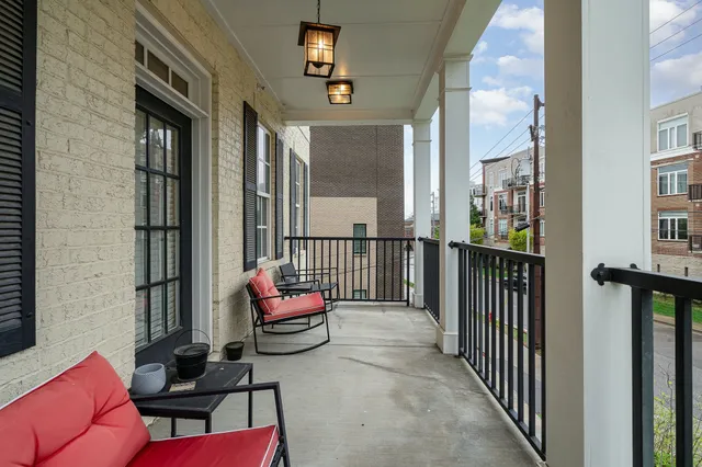 a view of a porch with furniture
