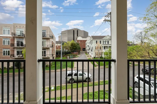 a view of city from a balcony