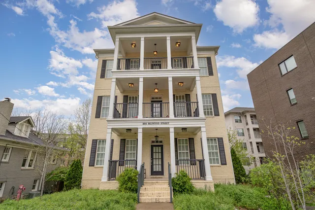 a front view of a multi story residential apartment building