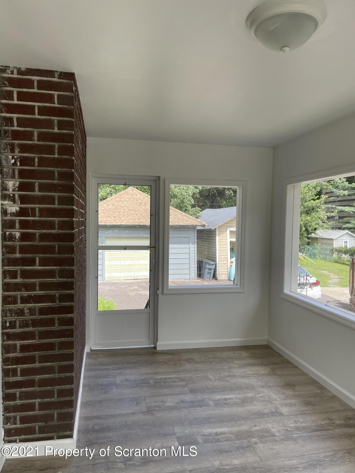 9 Front Street Clarks Summit, PA 18411 - Photo 11 of 22 a view of an empty room with a window
