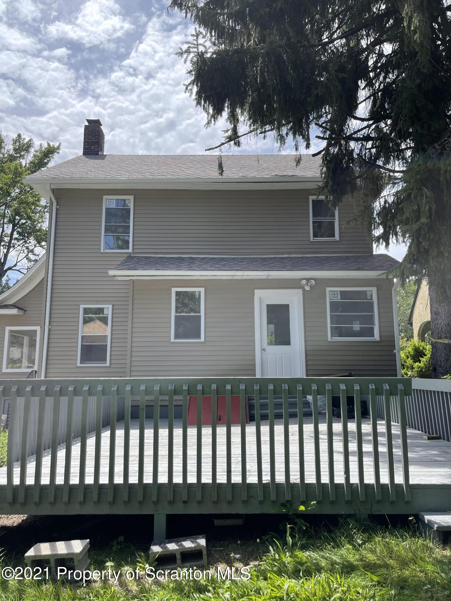 9 Front Street Clarks Summit, PA 18411 - Photo 4 of 22 a front view of a house