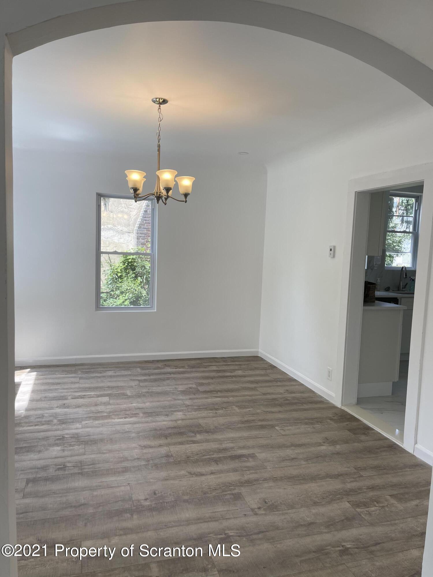 9 Front Street Clarks Summit, PA 18411 - Photo 8 of 22 a view of an empty room with a window