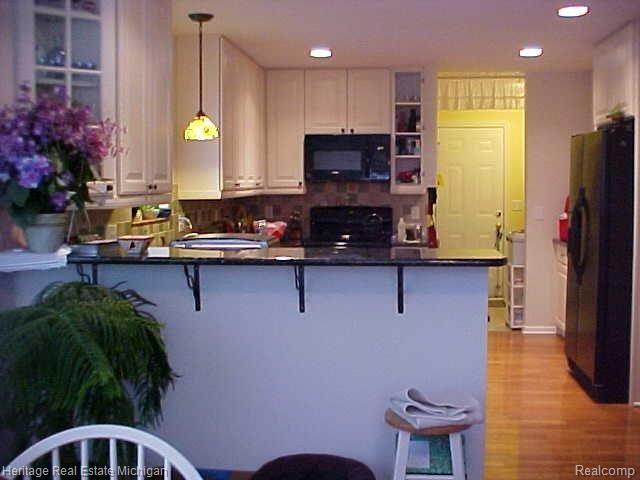 2419 North Hughes Road Howell, MI 48855 - Photo 4 of 14 View of Kitchen from Dinette