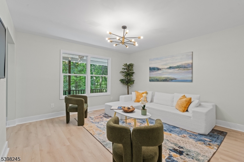51 Pidgeon Hill Road Wantage, NJ 07461 - Photo 12 of 39 a living room with furniture and a window