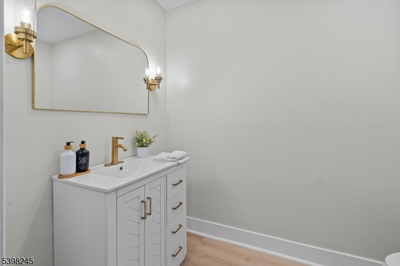 51 Pidgeon Hill Road Wantage, NJ 07461 - Photo 14 of 39 a bathroom with a sink and a mirror