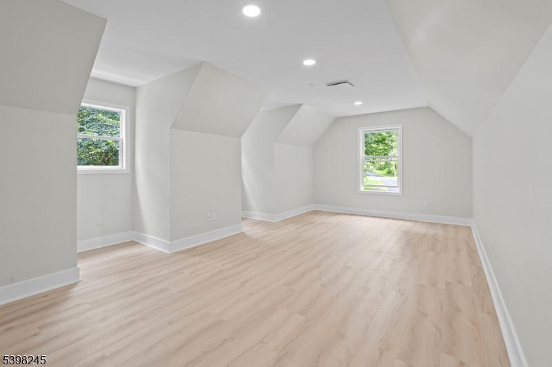 51 Pidgeon Hill Road Wantage, NJ 07461 - Photo 22 of 39 an empty room with wooden floor and windows