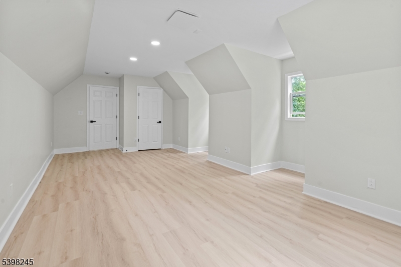 51 Pidgeon Hill Road Wantage, NJ 07461 - Photo 23 of 39 an empty room with wooden floor and windows