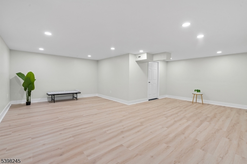 51 Pidgeon Hill Road Wantage, NJ 07461 - Photo 28 of 39 a view of empty room with wooden floor