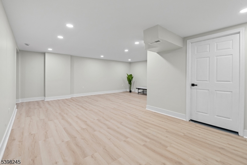 51 Pidgeon Hill Road Wantage, NJ 07461 - Photo 29 of 39 a view of empty room with wooden floor