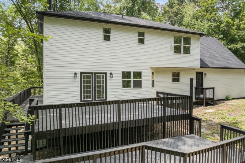 51 Pidgeon Hill Road Wantage, NJ 07461 - Photo 31 of 39 a view of a house with a wooden deck
