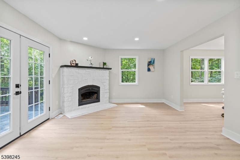 51 Pidgeon Hill Road Wantage, NJ 07461 - Photo 8 of 39 a view of a livingroom with a fireplace and window