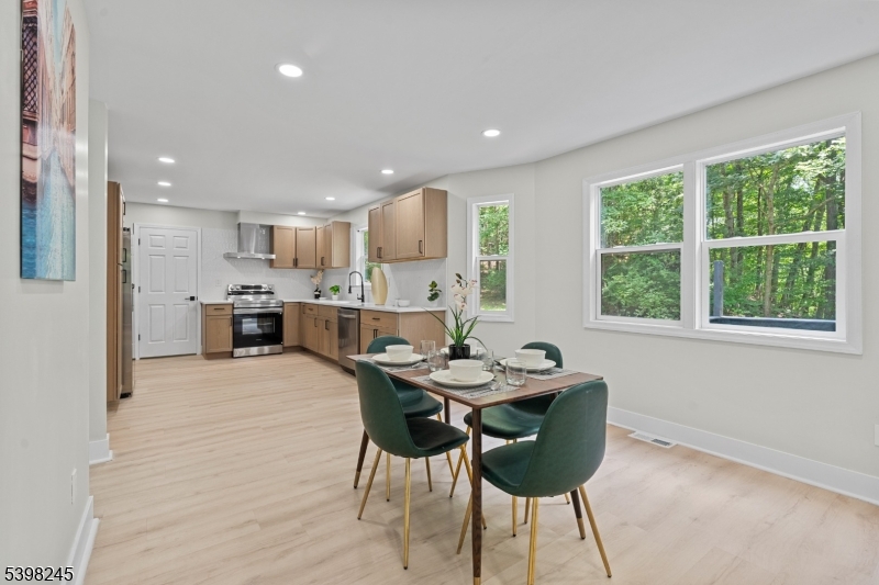 51 Pidgeon Hill Road Wantage, NJ 07461 - Photo 9 of 39 a dining room with furniture and window
