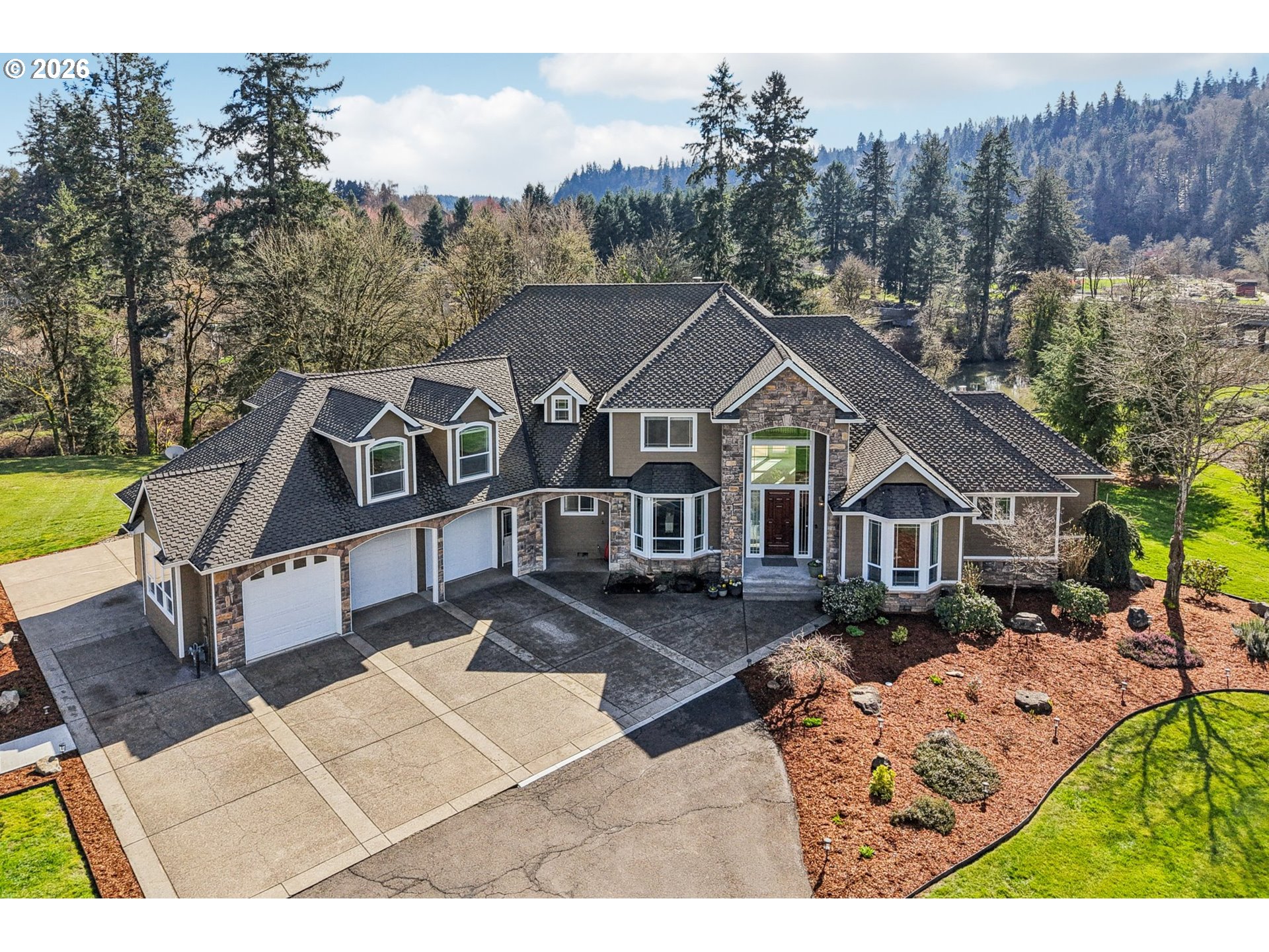 23044 Southwest Ulsky Road West Linn, OR 97068 - Photo 1 of 48 a house with trees in the background