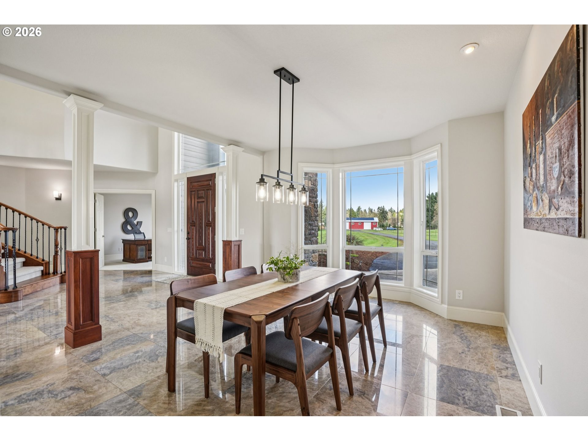 23044 Southwest Ulsky Road West Linn, OR 97068 - Photo 11 of 48 a view of a dining room with furniture window and wooden floor
