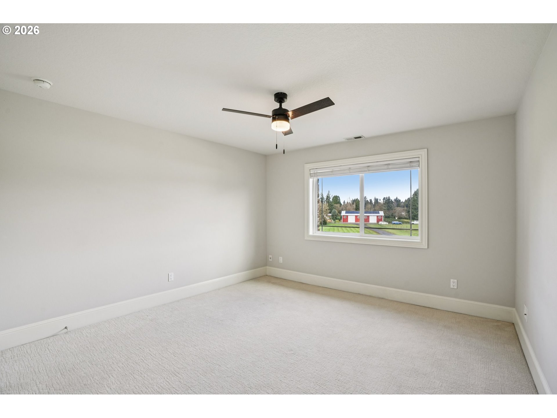 23044 Southwest Ulsky Road West Linn, OR 97068 - Photo 19 of 48 a view of an empty room with a window