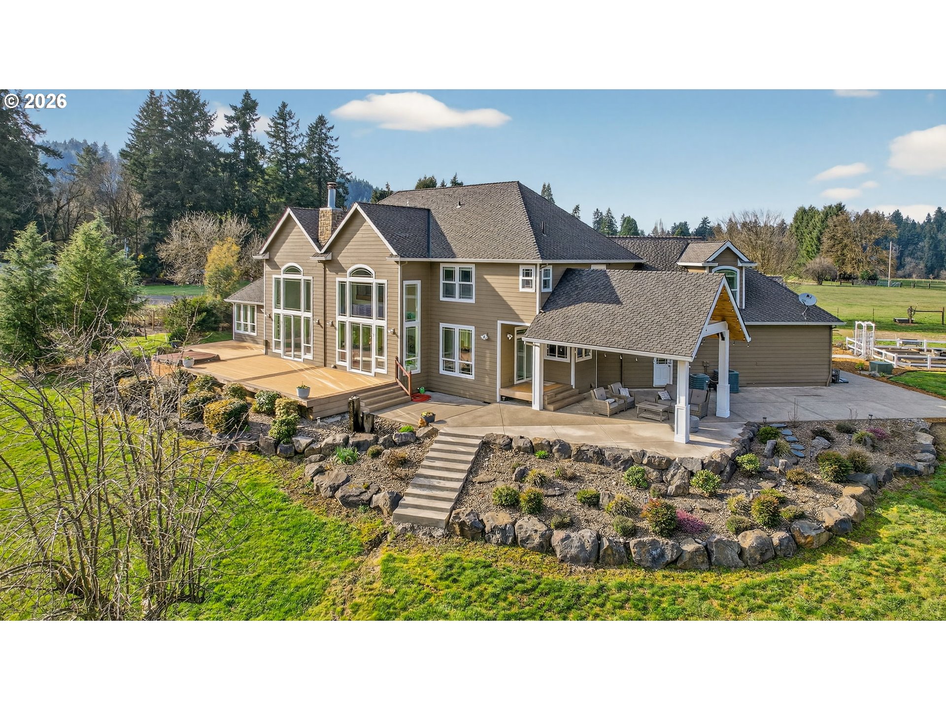 23044 Southwest Ulsky Road West Linn, OR 97068 - Photo 2 of 48 a picture of a house with a garden