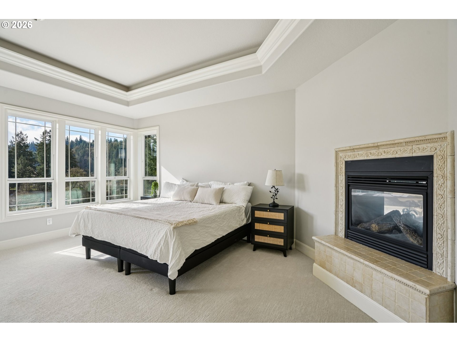 23044 Southwest Ulsky Road West Linn, OR 97068 - Photo 23 of 48 a bedroom with a bed chair and a large window