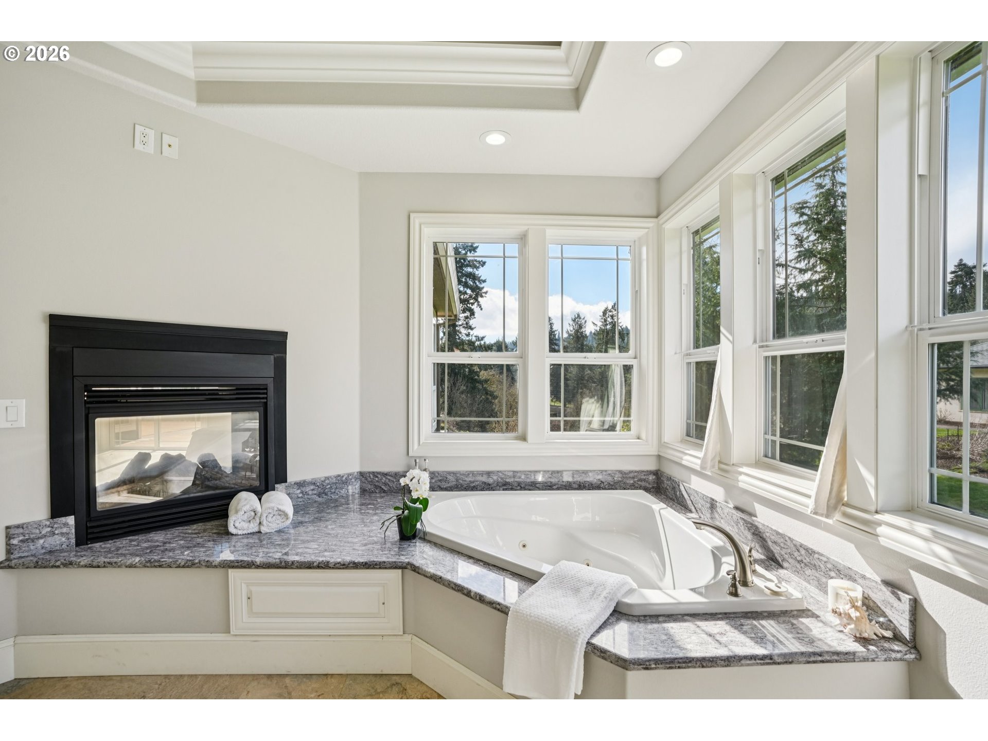 23044 Southwest Ulsky Road West Linn, OR 97068 - Photo 27 of 48 a spacious bathroom with a granite countertop tub sink and mirror