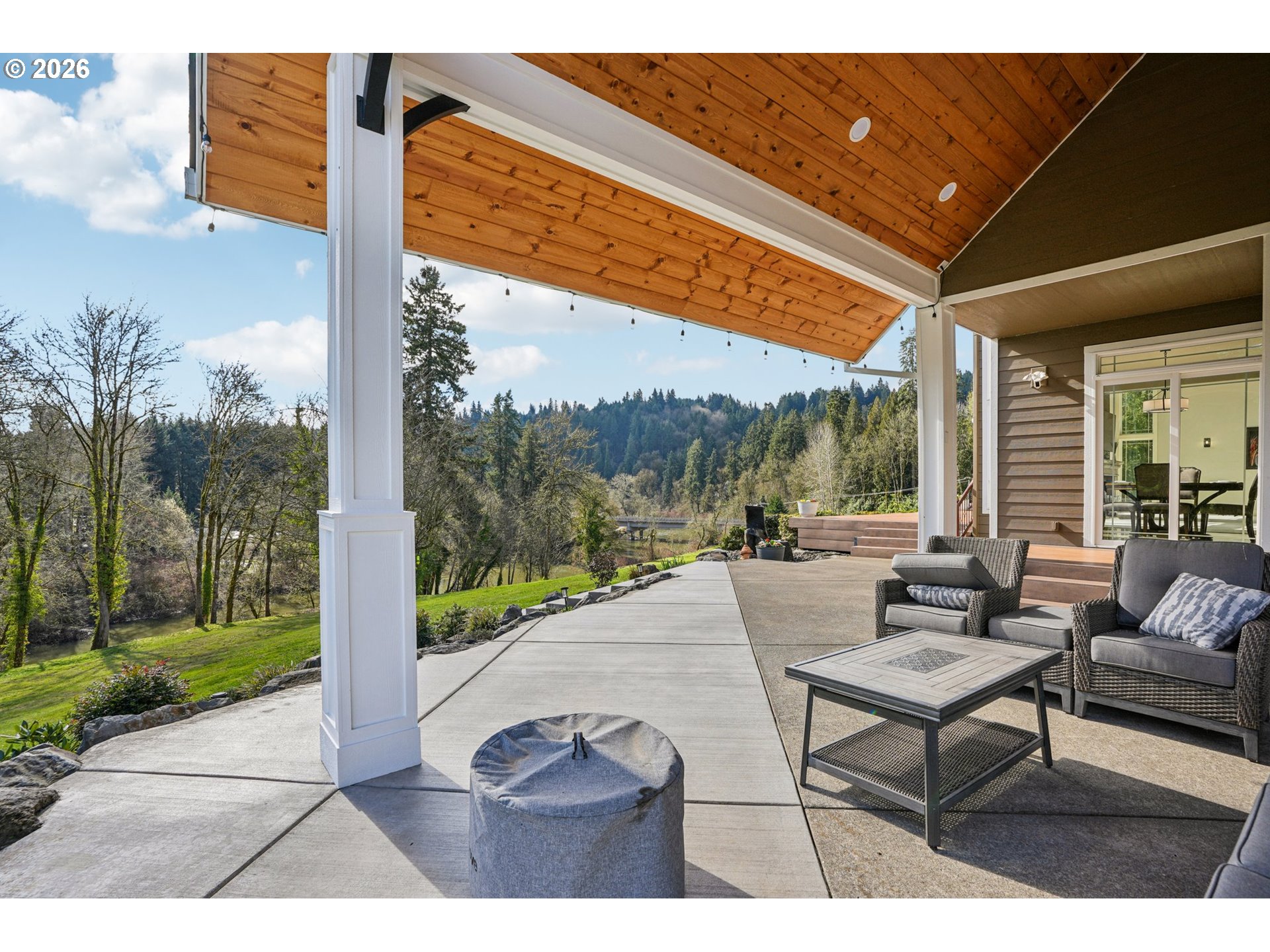 23044 Southwest Ulsky Road West Linn, OR 97068 - Photo 36 of 48 a building outdoor space with patio furniture and garden