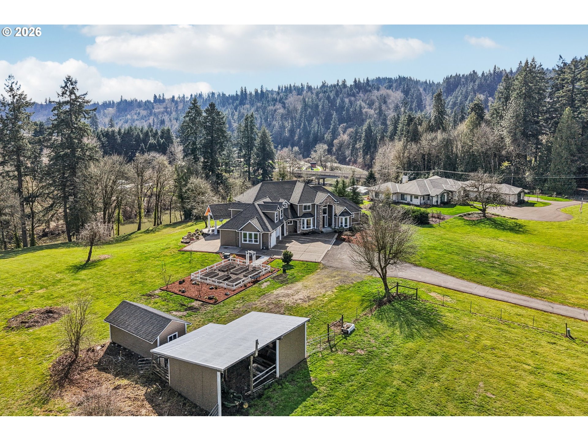 23044 Southwest Ulsky Road West Linn, OR 97068 - Photo 42 of 48 a view of yard with swimming pool and trees in the background