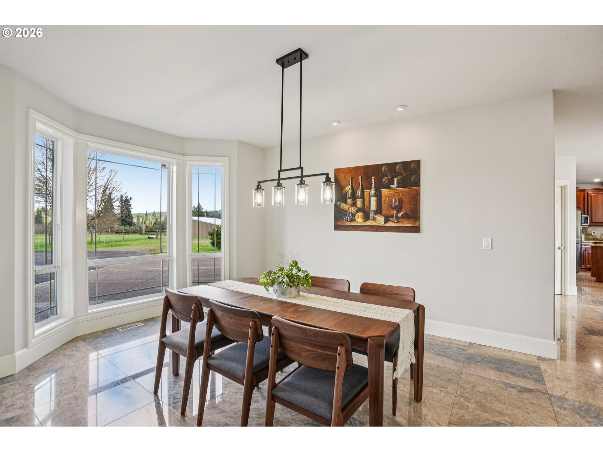 23044 Southwest Ulsky Road West Linn, OR 97068 - Photo 10 of 48 a dining room with furniture and wooden floor