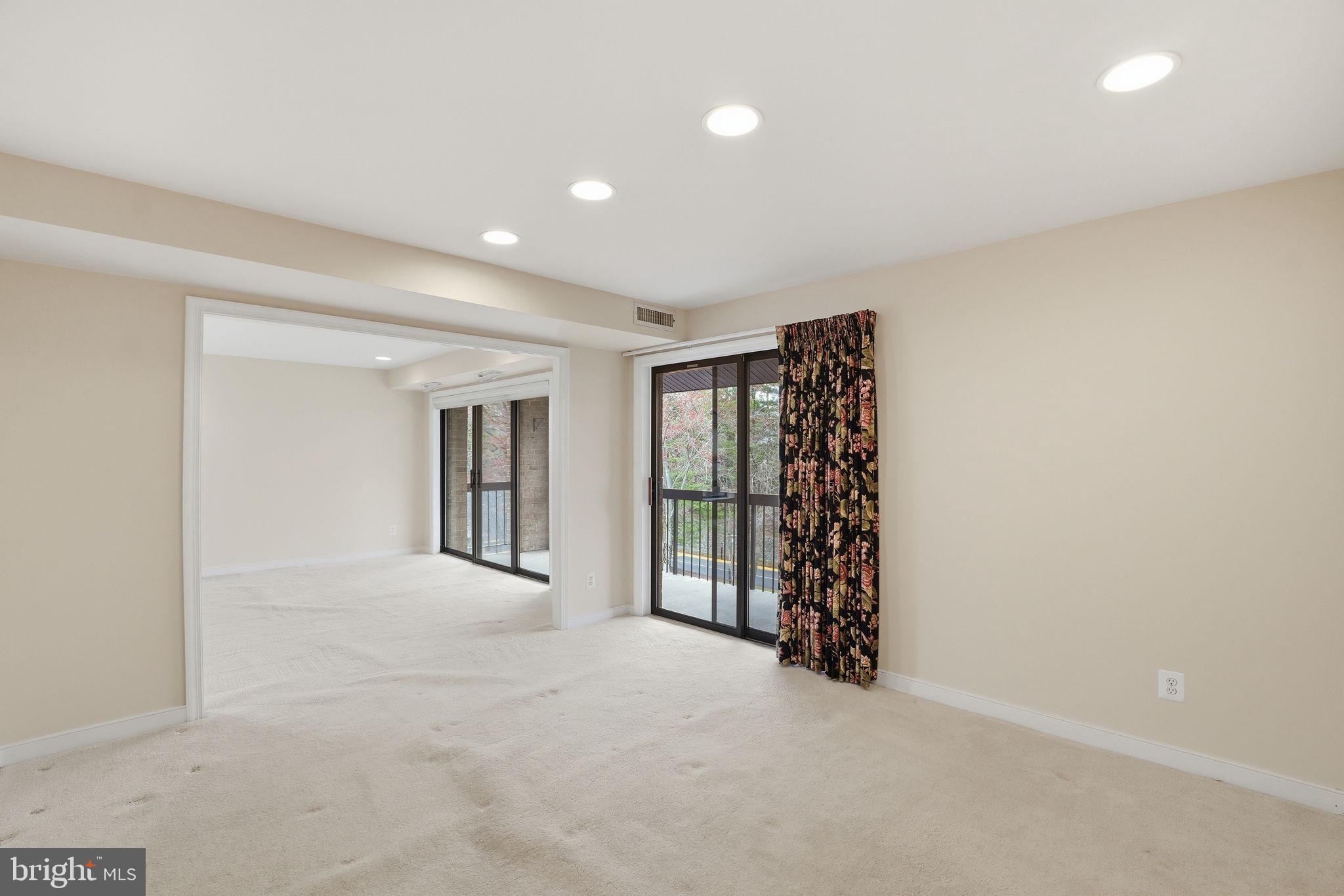 11400 Strand Drive, Unit R402 Rockville, MD 20852 - Photo 11 of 38 View from dining room toward living room