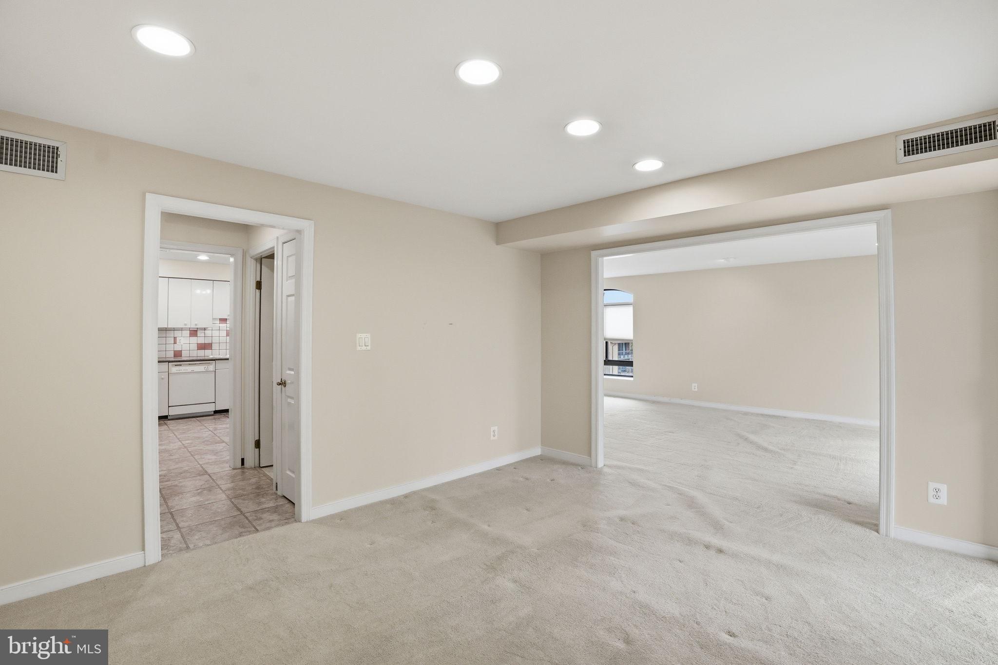 11400 Strand Drive, Unit R402 Rockville, MD 20852 - Photo 12 of 38 Dining room with view of kitchen and living room