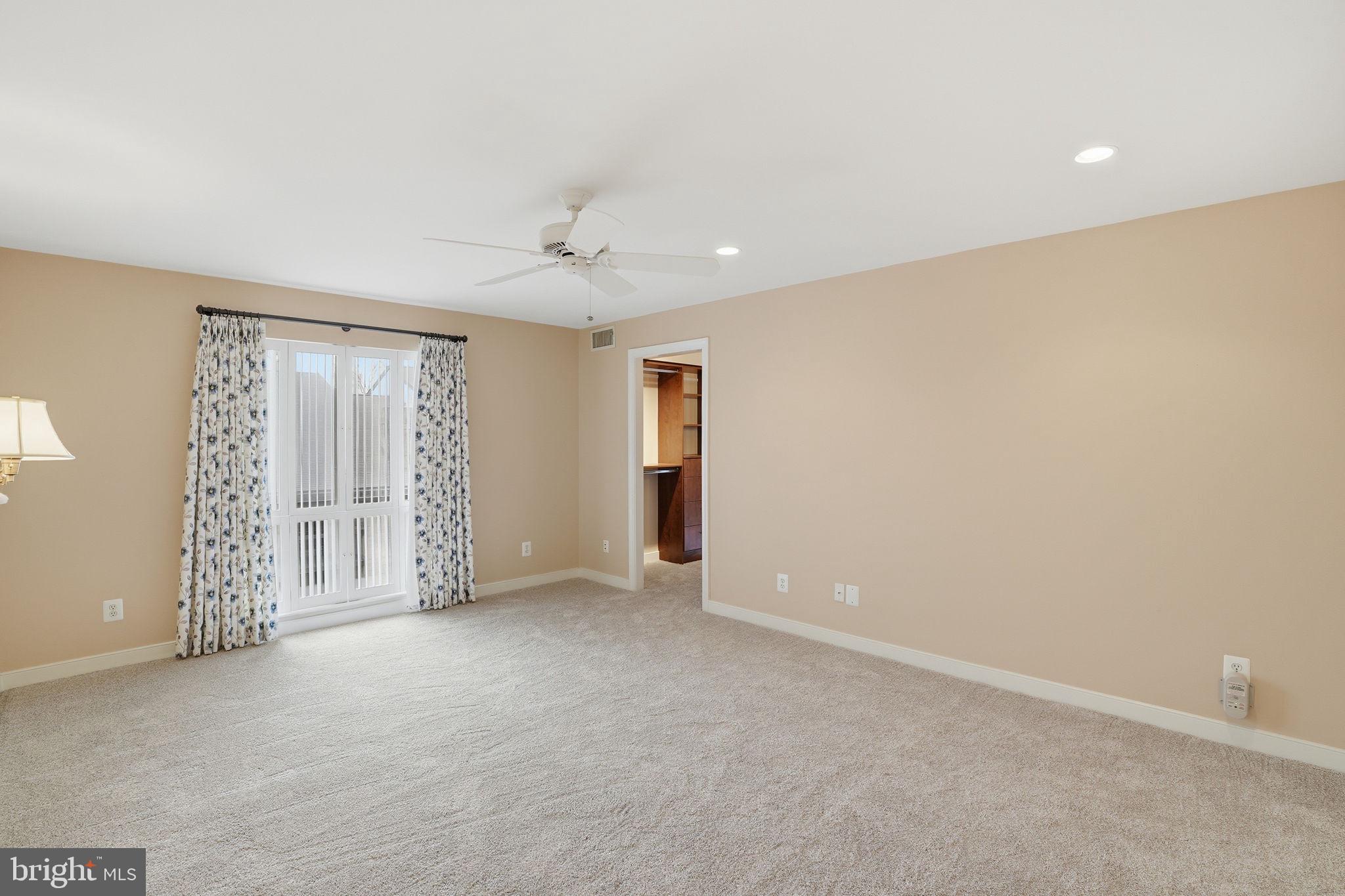 11400 Strand Drive, Unit R402 Rockville, MD 20852 - Photo 18 of 38 New carpet in Primary Bedroom
