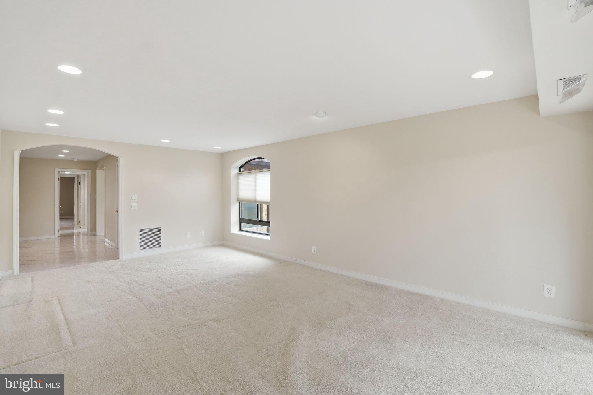 11400 Strand Drive, Unit R402 Rockville, MD 20852 - Photo 6 of 38 Entry foyer leads to a spacious living room