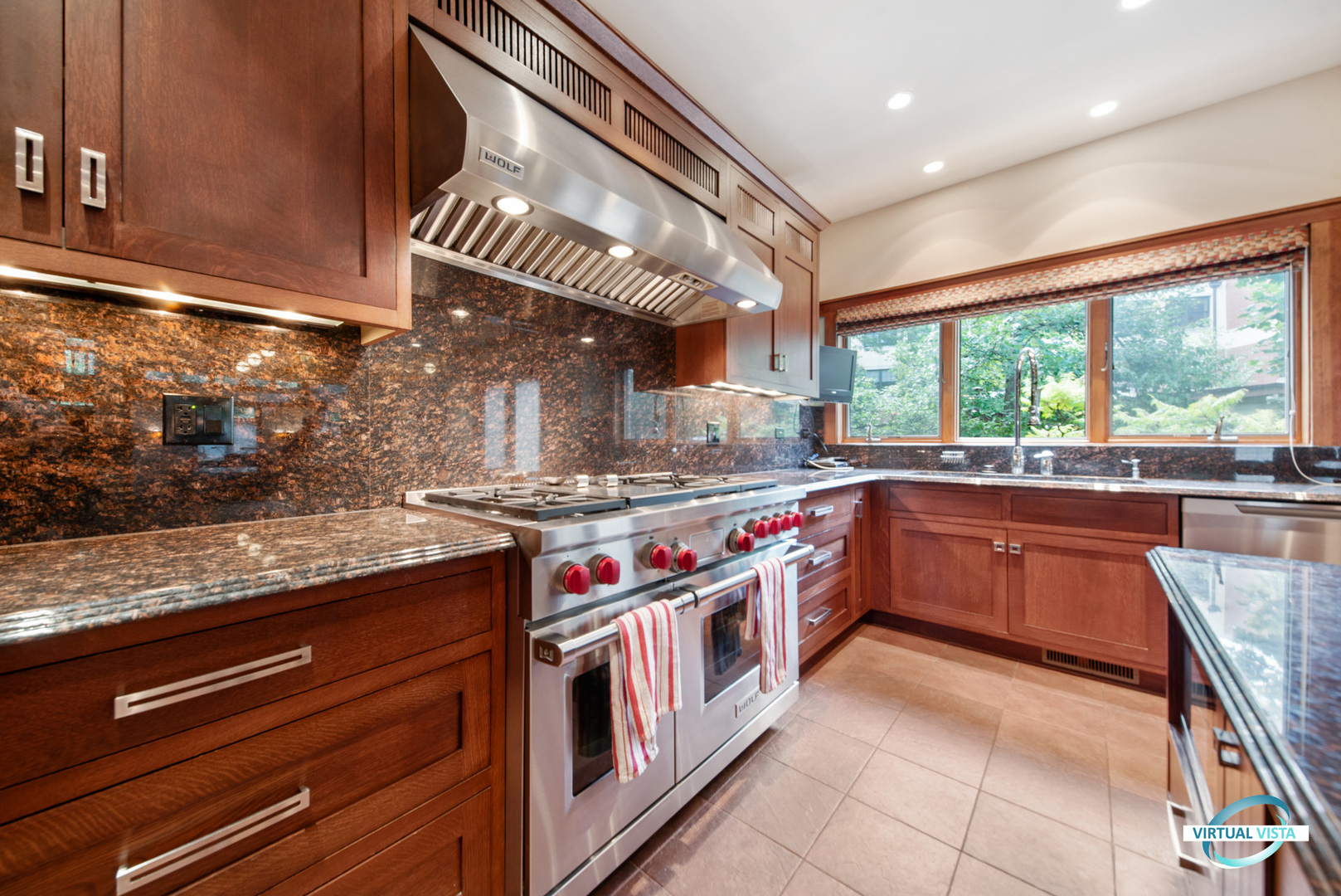 37 Longcommon Road Riverside, IL 60546 - Photo 14 of 34 a kitchen with stainless steel appliances granite countertop a stove and a sink