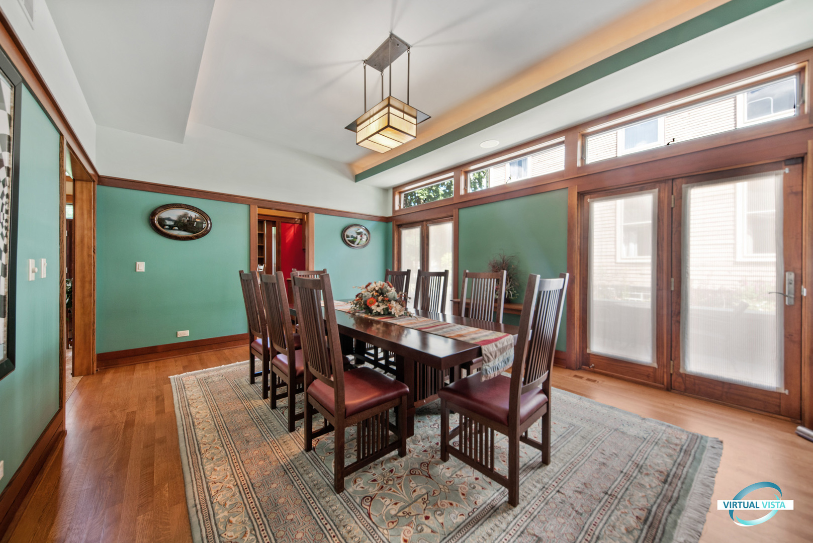 37 Longcommon Road Riverside, IL 60546 - Photo 20 of 34 a dining room with furniture a rug and a floor to ceiling window