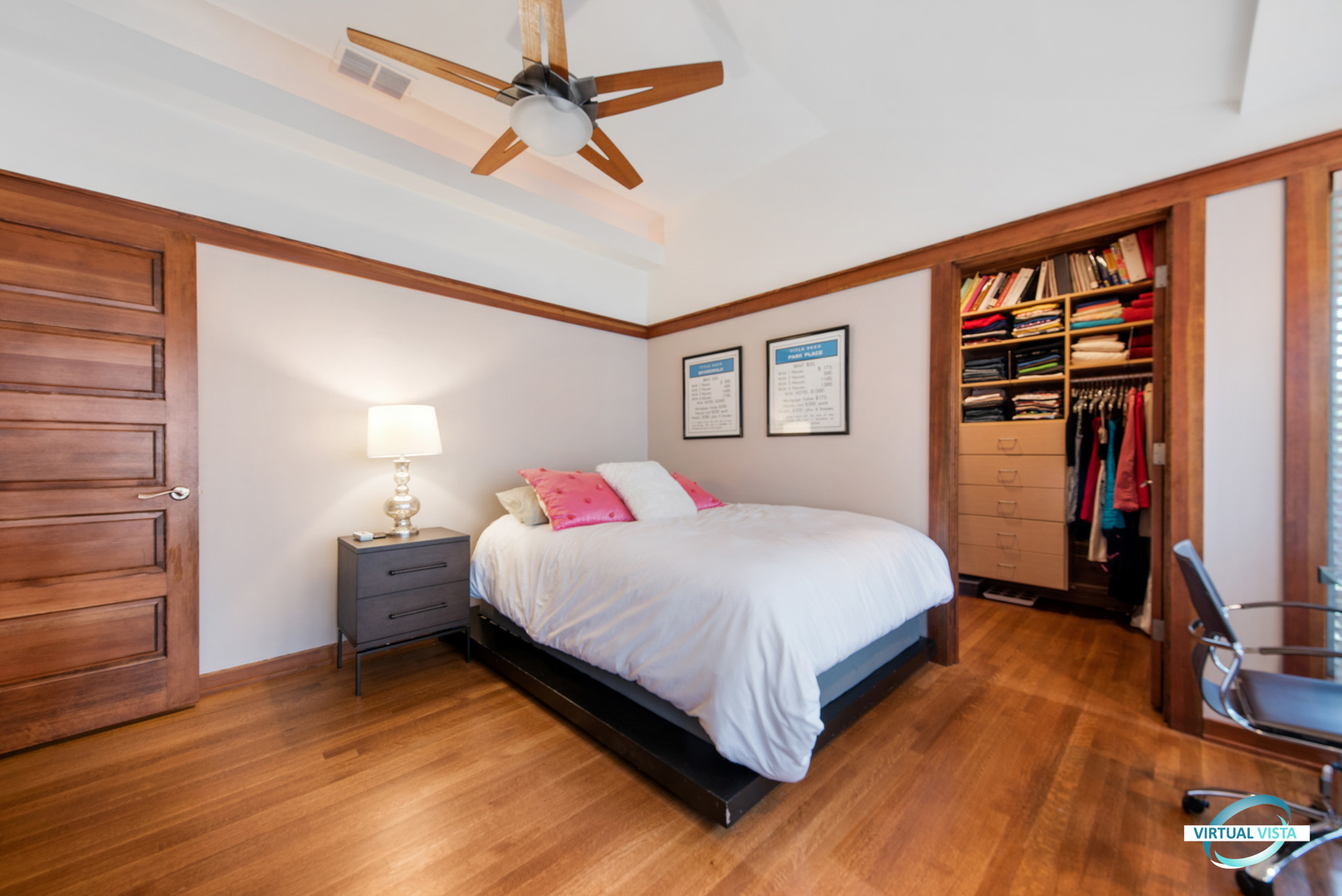 37 Longcommon Road Riverside, IL 60546 - Photo 27 of 34 a bedroom with a bed and a flat screen tv