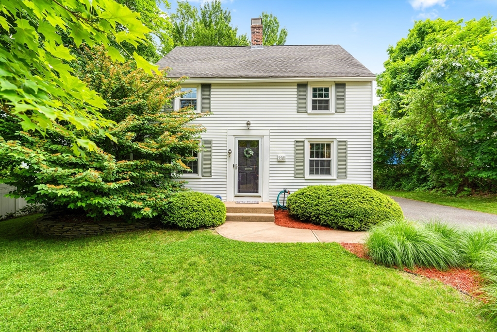 235 Emerson Street Springfield, MA 01118 - Photo 25 of 25 a front view of a house with a garden
