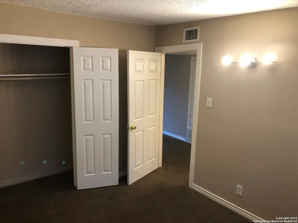 a view of a backyard with a garden