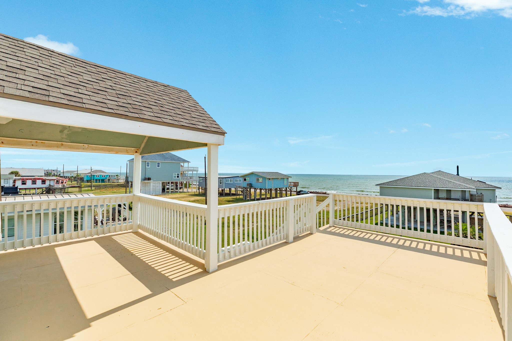 805 Seashell Drive Surfside Beach, TX 77541 - Photo 20 of 25 Second floor sun deck has fresh paint and amazing ocean views