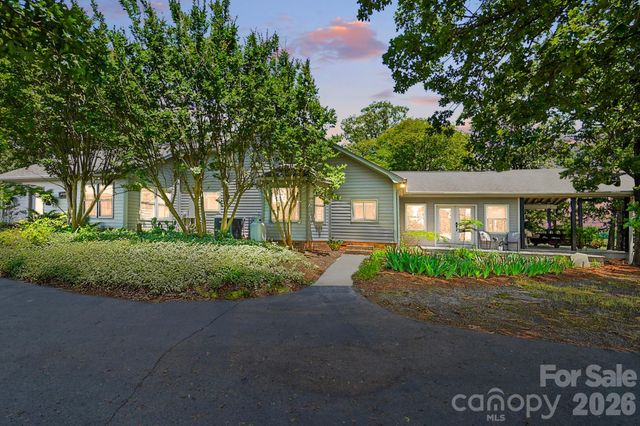 a view of a big yard in front of a house