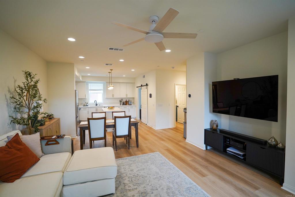 8375 Tahoe Street Lemon Grove, CA 91945 - Photo 1 of 27 a living room with furniture and a flat screen tv