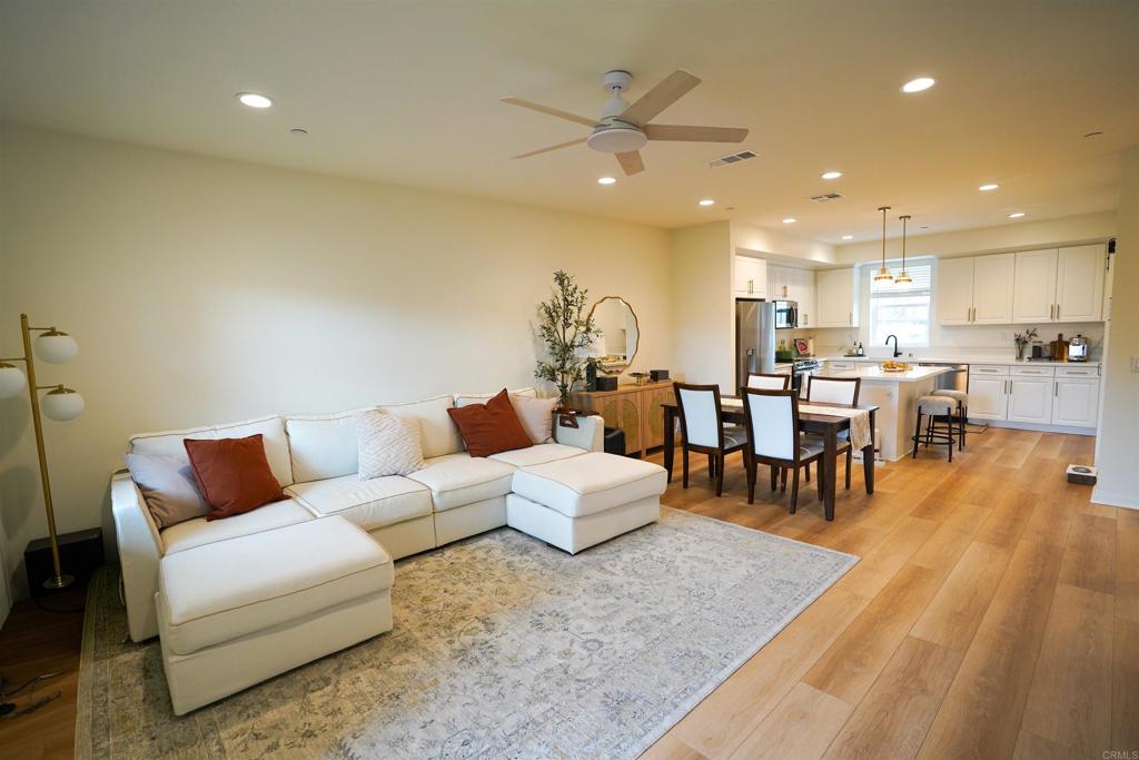 8375 Tahoe Street Lemon Grove, CA 91945 - Photo 2 of 27 a living room with lots of furniture and kitchen view